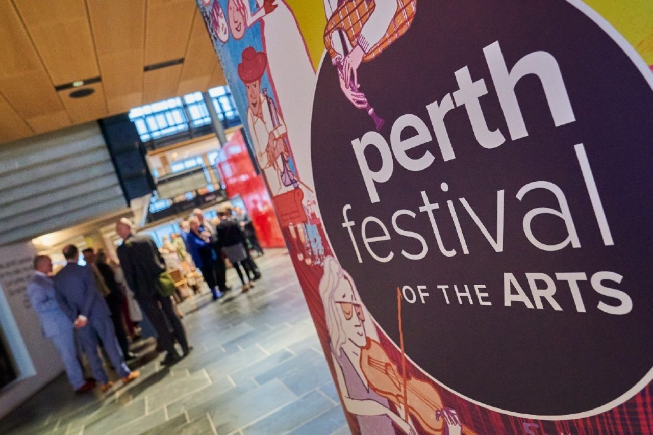 A purple circle with the text 'Perth Festival of the Arts' written in white.