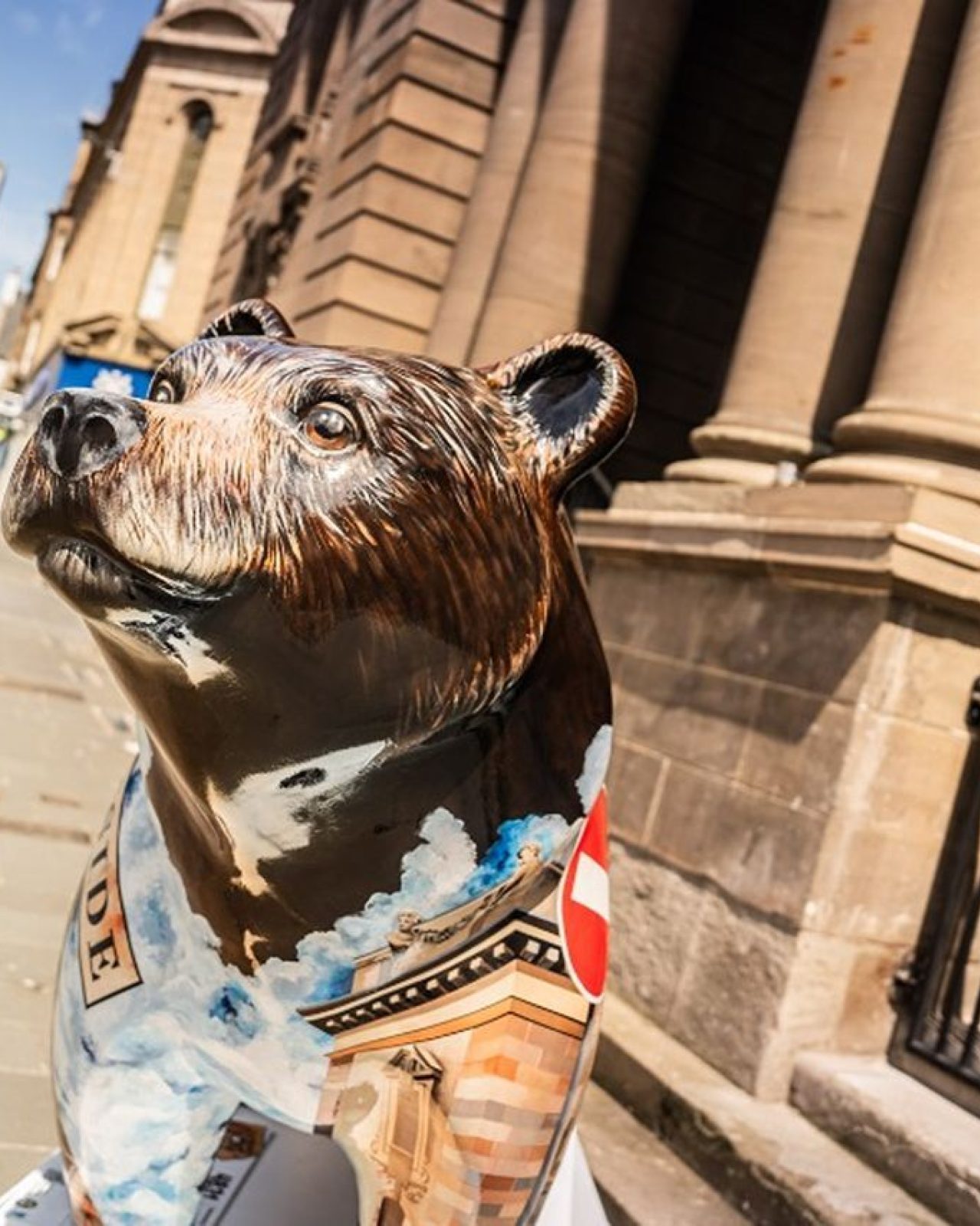 A brown bear with Perth Museum painted on it outside the real Perth Museum.