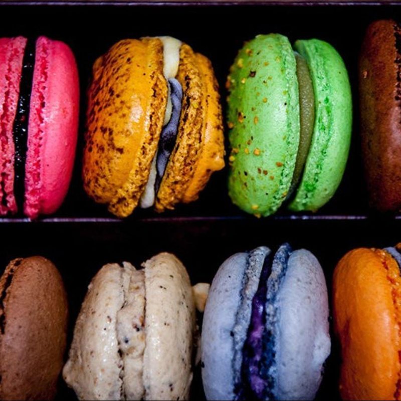 Close up of brightly coloured French macarons