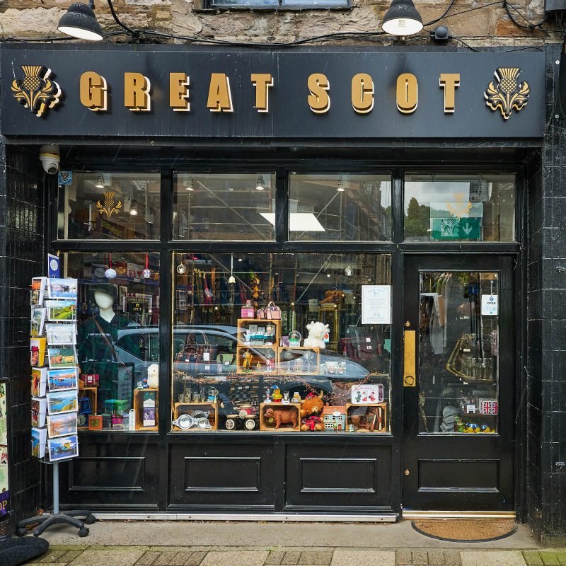 A black building with gold text which reads 'Great Scot'.