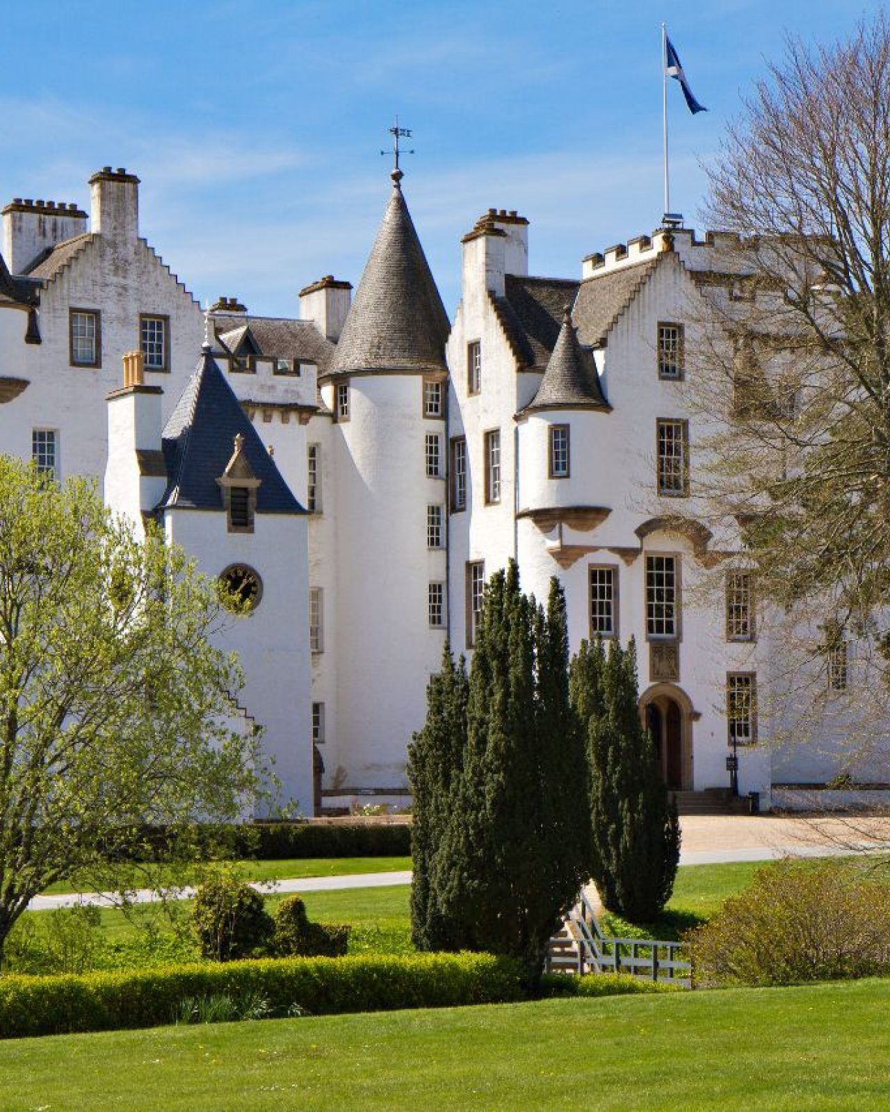 A large white castle and its grounds